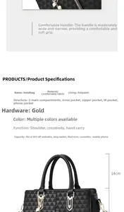Detail view of black geometric handbag featuring gold hardware and multiple compartments