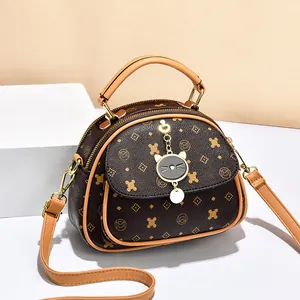Women's multi-layer crossbody bag in brown monogram PU leather with cute cat charm