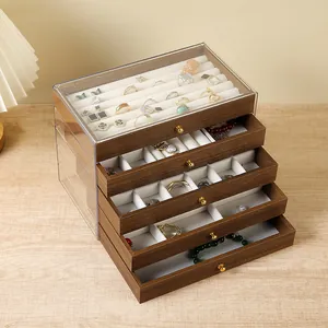 Detail of five-layer walnut grain jewelry box with acrylic lid and velvet dividers
