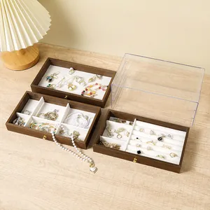 Three-layer walnut jewelry box with transparent acrylic lid and velvet compartments
