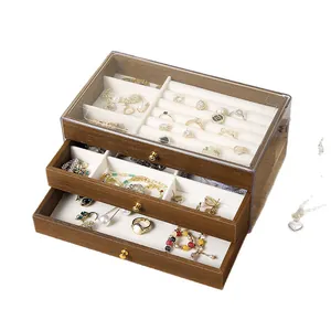 Three-layer walnut wood jewelry box with transparent lid and storage drawers