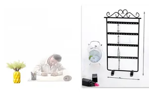 Detail view of 48-hole iron earring display stand with height and width dimensions