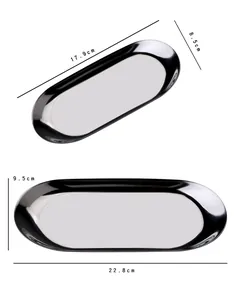 Λεπτομέρεια macro δύο χρυσών οβάλ δίσκων με φινίρισμα καθρέφτη και ακριβείς διαστάσεις
