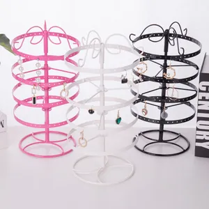 Rotating iron earring stand with multi-tier display in pink, white and black finishes