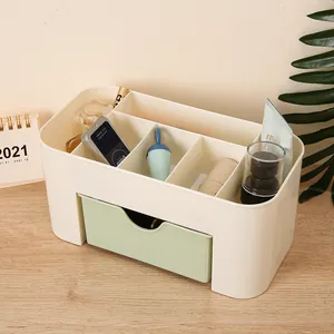 Cream and green desktop cosmetic organizer with multi-grid compartments and storage drawer