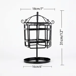 Rotating black iron birdcage jewelry display stand for earrings with a storage base tray