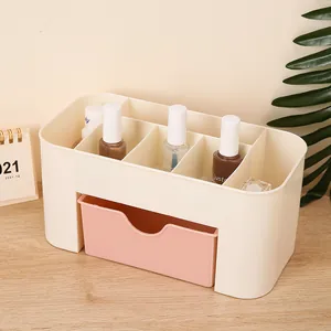 Cream desktop cosmetic organizer with a pink drawer and multi-grid storage slots