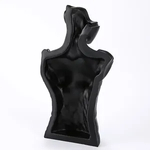Black silicone resin mold featuring a detailed 3D artistic human torso model