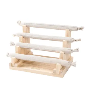 4-tier wooden jewelry stand with linen tiers for organizing bracelets and necklaces
