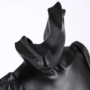 Close-up of matte black resin mannequin bust showing detailed eye and nose profile