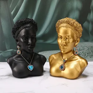 Busti africani nordici in resina nero e oro per esposizione di gioielli e orecchini