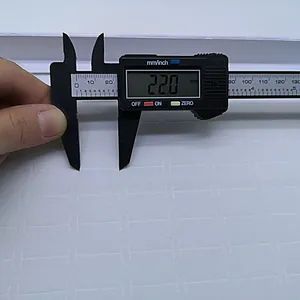 Digital caliper measuring jewelry box sponge padding thickness with precision LCD display