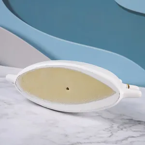 Detail view of the Nordic resin palm ring tray featuring an oval base with a matte finish