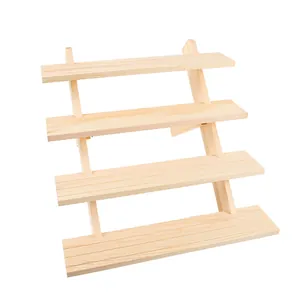 Detailed view of four-tier wooden stepped display stand for jewelry and collectibles