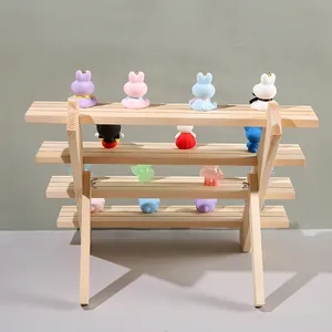 Detailed four-tier wooden step display stand for collectible dolls and accessories