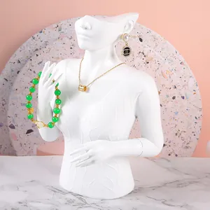 Resin mannequin bust jewelry display stand with necklace, bracelet and earrings
