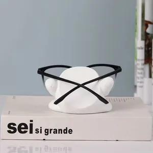 Porta occhiali moderno in resina bianca dal design astratto per scrivania creativa di casa