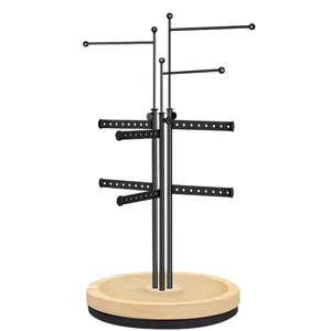 Rotating black metal jewelry stand with wooden base for necklaces and earrings