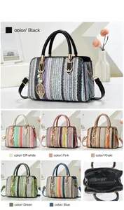 Detail view of colorful striped handbag featuring gold hardware and internal compartments