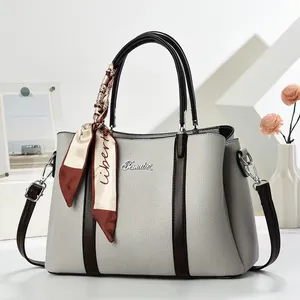 Fashionable grey large capacity tote bag with decorative scarf and shoulder strap