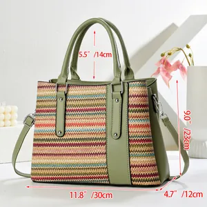Detailed size chart of the woven handbag with dimensions in centimeters and inches