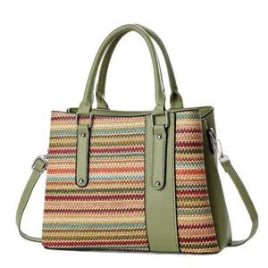 Chic woven tote bag with olive green faux leather and colorful wavy pattern