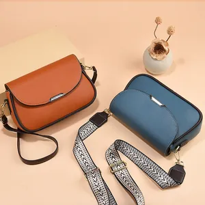 Sacs bandoulière en cuir pour femme en marron et bleu avec bandoulières tissées chic