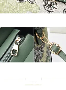 Detalle de la textura de cuero paisley verde y herrajes metálicos dorados del bolso