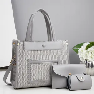 Ensemble de sacs cabas gris trois pièces avec bordure en cuir et panneaux tissés