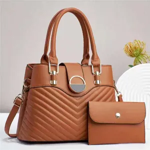 Brown V-quilted faux leather handbag and wallet set with gold hardware for women