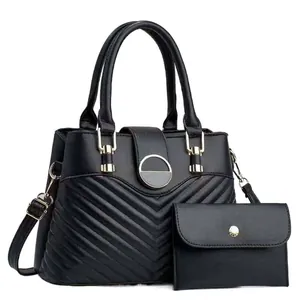 Women's black V-quilted tote bag set with matching wallet and adjustable strap