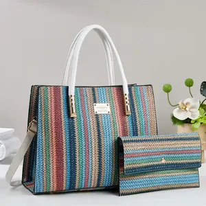 Large colorful striped straw tote bag and wallet set with white handles and shoulder strap