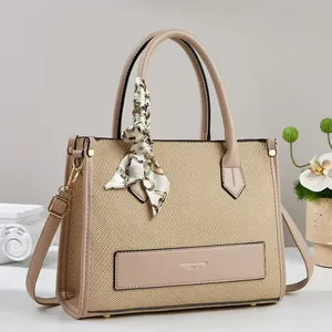 Large beige patchwork canvas tote bag with silk scarf decoration and leather trim