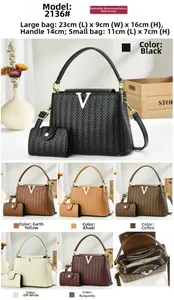 Detailed view of woven texture tote bag set with metal V accent and interior zip pocket