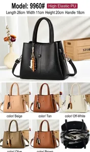 Sac à main en cuir PU grainé avec pompon perlé et intérieur à plusieurs compartiments
