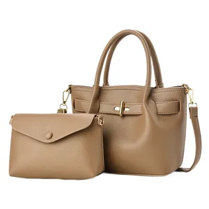 Brown faux leather large tote bag and matching pouch with gold-tone metal hardware