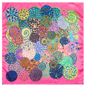 Luxurious pink square silk scarf featuring artistic colorful spiral geometric patterns