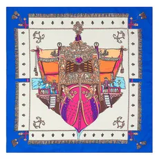Flat lay view of a silk square scarf featuring a vintage sailing ship and royal blue borders