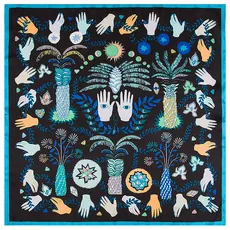 Flat lay of square silk scarf featuring bohemian geometric patterns and surrealist palm motifs