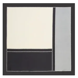 Close-up of geometric color-block silk scarf with pearl dot trim in ivory, gray, and black