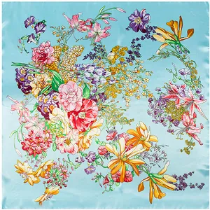 Flat lay of a 90cm square silk scarf featuring colorful butterfly and floral patterns