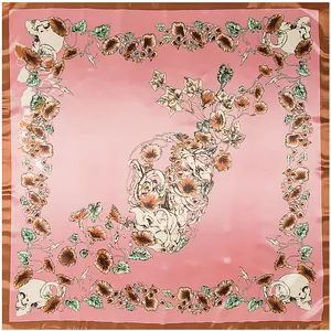 Detailed pattern of skull and morning glory flowers on a pink satin square scarf