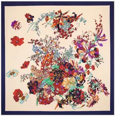 Detailed flat lay of a square silk scarf featuring colorful floral prints and navy borders
