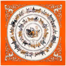 Detailed close-up of a classic pumpkin carriage pattern on a square silk scarf
