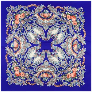 Detail of royal blue paisley silk scarf featuring ethnic rose and floral patterns