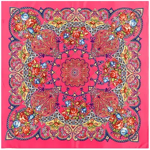 Detailed top view of paisley and floral patterns on bohemian pink square silk scarf
