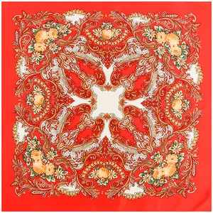 Close-up of ethnic style silk square scarf featuring red paisley and rose floral patterns