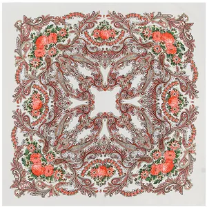 Detail of red rose clusters and paisley patterns on a white floral square shawl