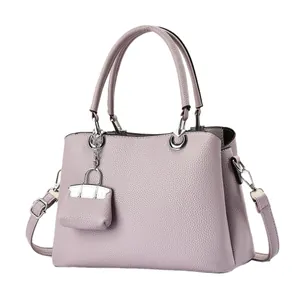 Chic lavender purple tote bag with litchi grain texture and adjustable shoulder strap