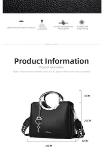Detailed view of black pebble leather handbag with silver handle and size dimensions